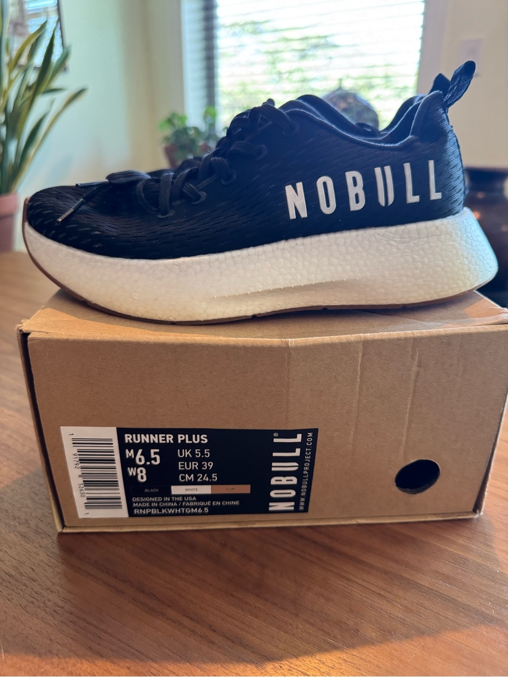NOBULL Woman's Runner Plus Black and White Sneaker